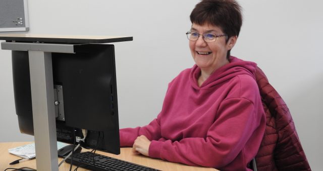 An image of a digital skills learner looking at their screen