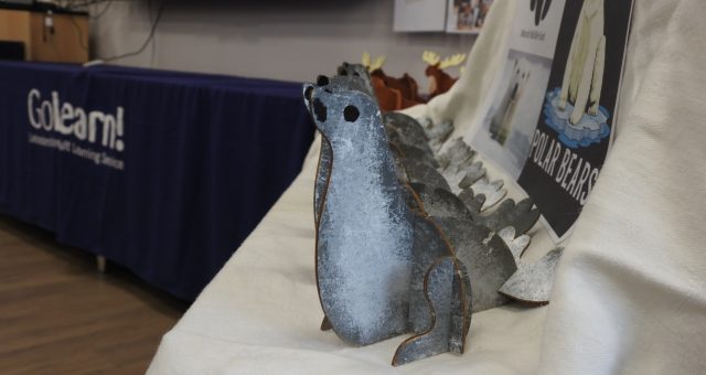 Image shows a painted wooden seal made by learners to raise money to sponsor an animal with WWF.