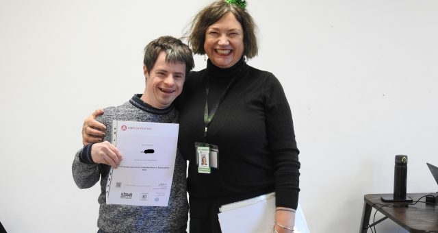 William poses with Debby, the coordinator for LFI courses in Coalville, after receiving his certificate from Amy McManus.