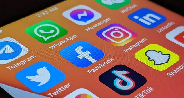Phone screen with social media app symbols